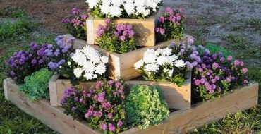 À quoi devrait ressembler un parterre de fleurs dans le pays et comment le faire