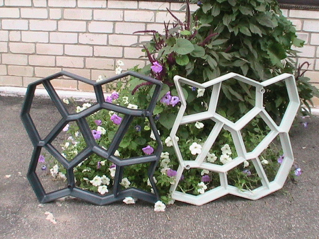 Pochoirs en plastique pour la production de dalles de pavage